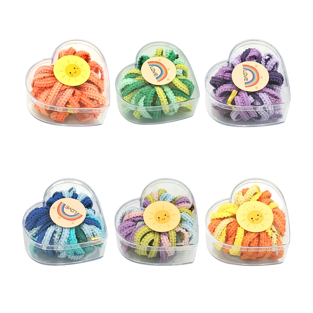 Estuche en forma de corazón con 40 mini ligas-donas para el cabello, variedad de colores / sticker de sol / lgc