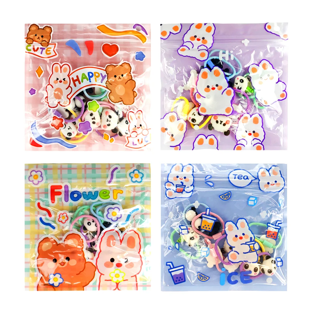 1 Bolsa / paquete de 10 ligas para el cabello infantiles, con figuras plásticas de animales animados, variedad de diseños / happy / flower / ice