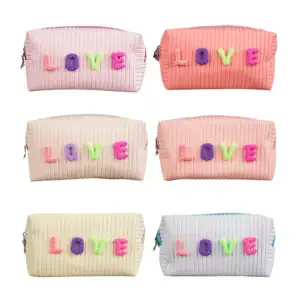Cosmetiquera de cuero con letras de peluche love, variedad de colores…
