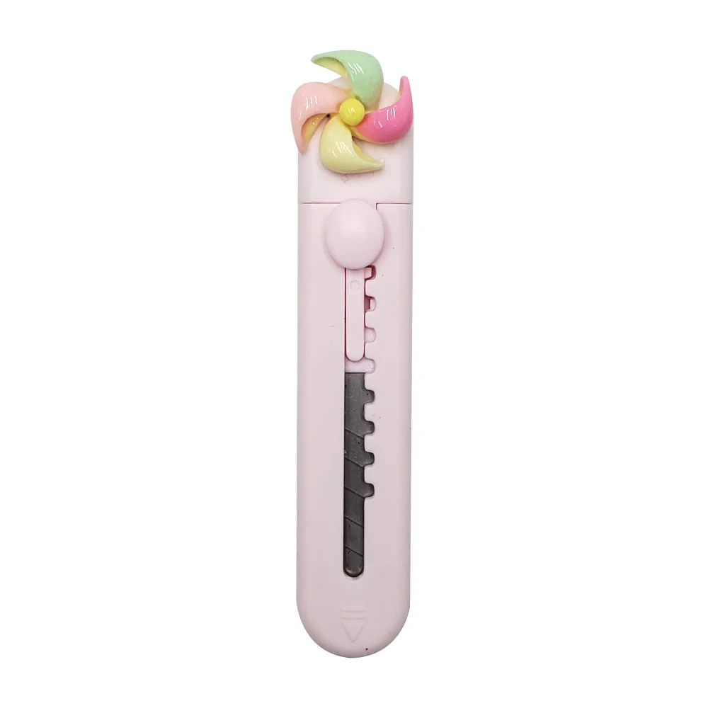 1pza Mini cutter con detalle de reguilete, variedad de colores / c-229