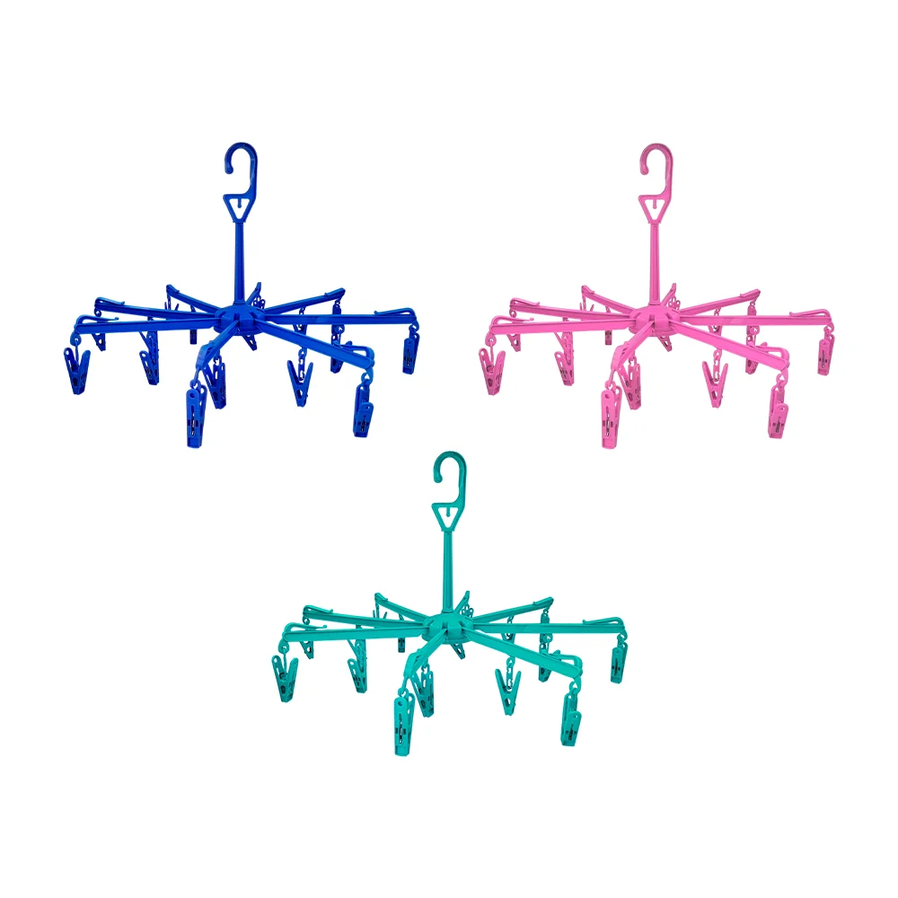 Tendedero carrusel de plástico en forma de pulpo con 8 ganchos y 16 pinzas para ropa, variedad de colores / clothes pegs