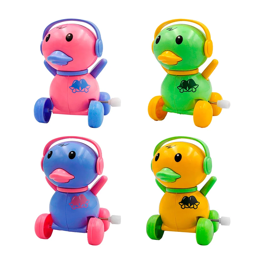 1pza Juguete infantil en forma de patito, con ruedas, audífonos y mecanismo de cuerda, variedad de colores / y-d575