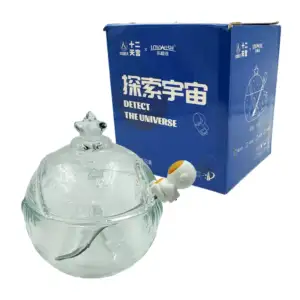 Azucarera de vidrio en forma de planeta + mini cuchara de astronauta,…