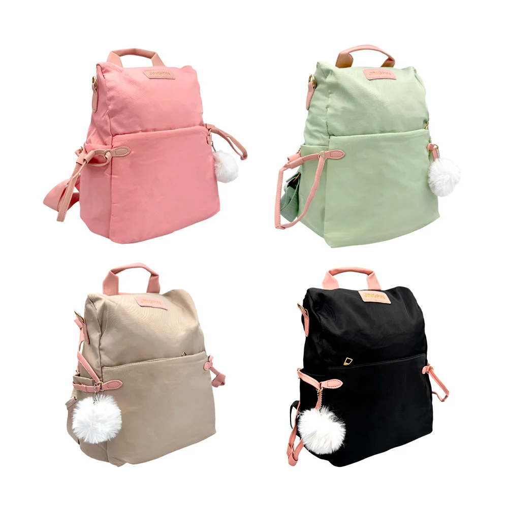 Mochila pequeña lisa de 2 compartimentos con tirantes de cuero y satinado, pompón y correa, variedad de colores / bb-1195