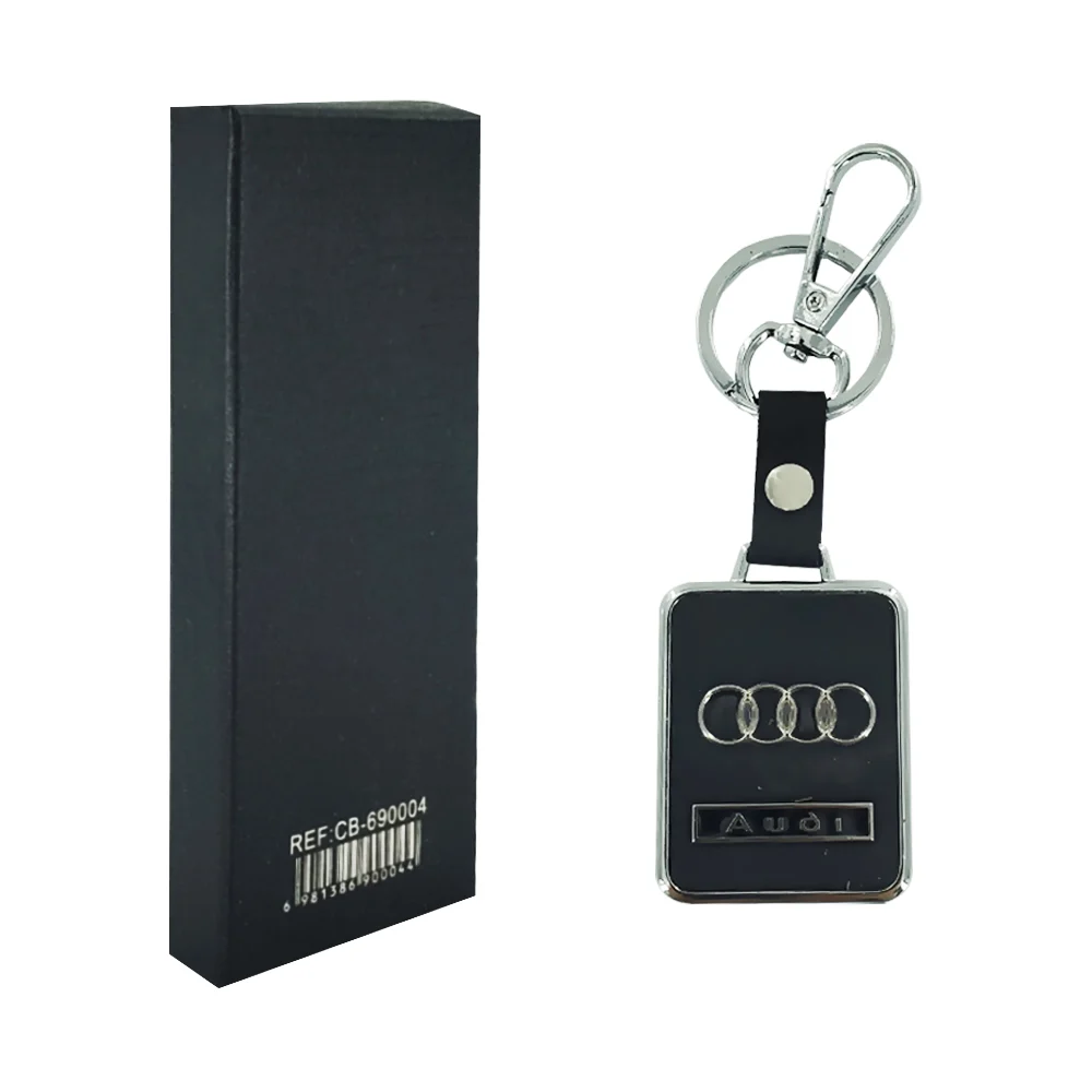 Llavero placa rectangular 5x4cm de tipo cuero con logo 4 aros y nombre marca de auto / cb-690004