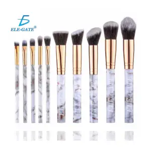 Set de 10 brochas con manjo tipo mármol  y cerdas suaves para maquill…