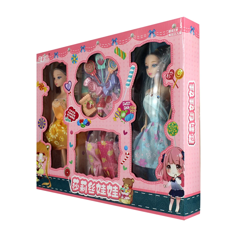 Par de muñecas gemelas con vestidos intercambiables y figuras de golosinas / 636-58