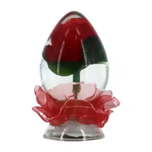 Rosa encapsulada en forma de huevo transparente con luz led multicolo…