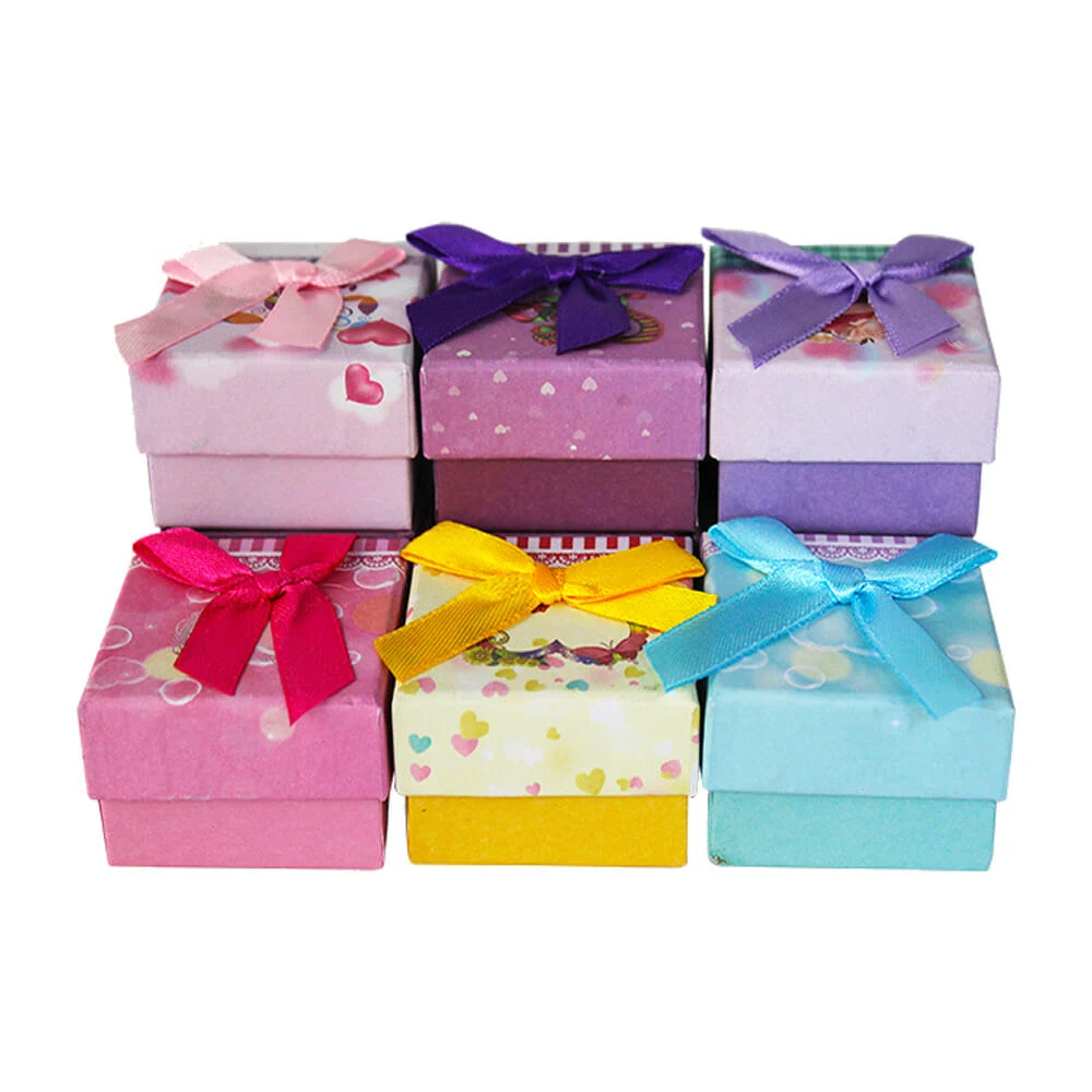 Mini caja con moño y diseño estampado ...