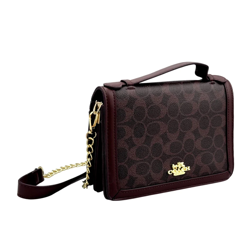 Bolsa pequeña rígida con estampado monograma, placa decorativa y doble botón
