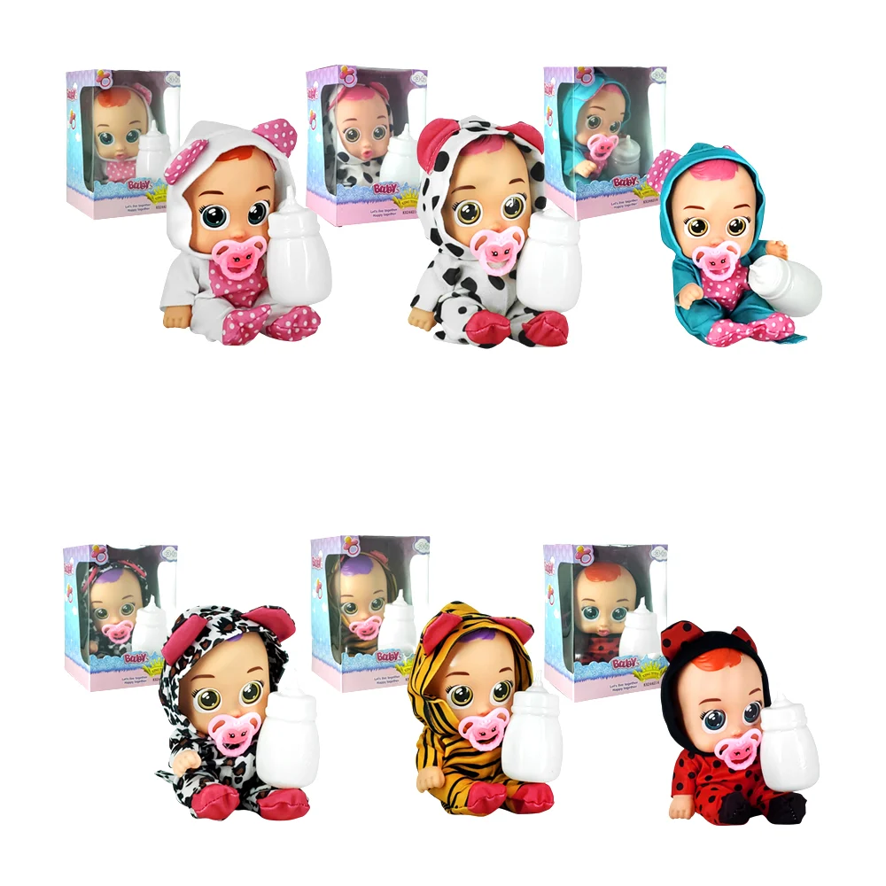 Muñeca bebé con mameluco, biberón y chupón, variedad de modelos / kx244214