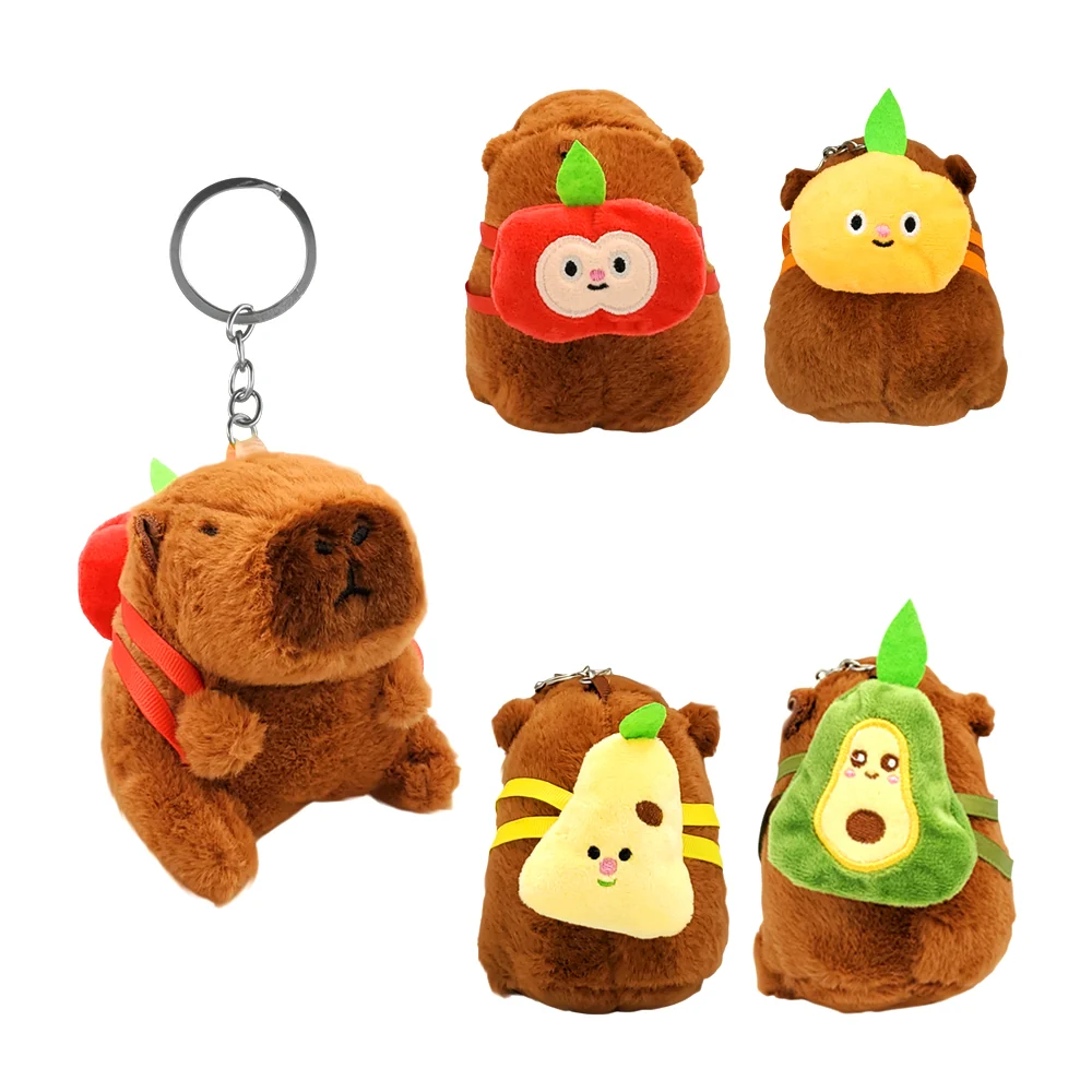 Llavero pequeño en forma de capibara afelpado con mochila de frutas
