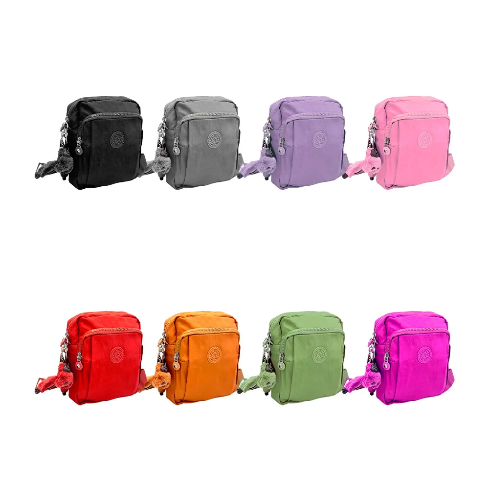 Bolsa kipling pequeña con 2 compartimentos + llavero de mono, color surtido