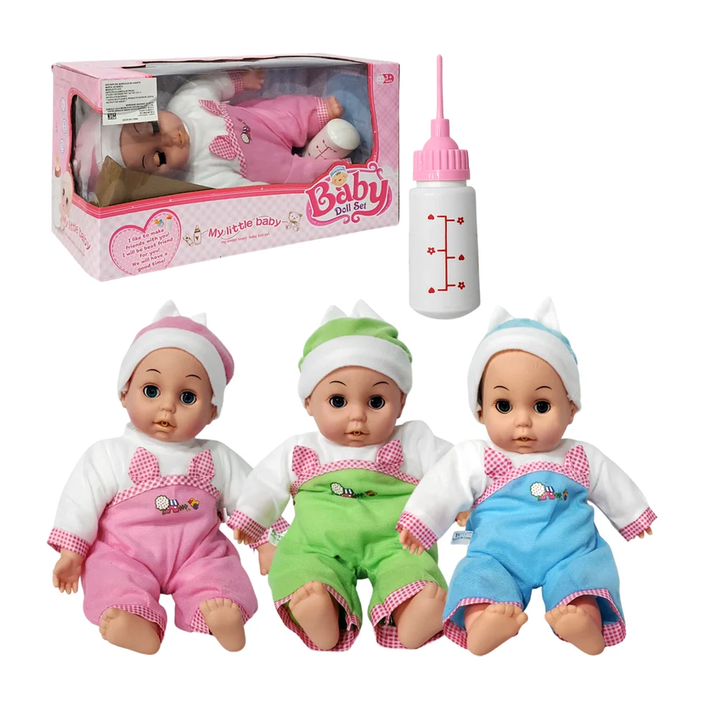 1pza Juguete / muñeca en forma de bebé, con biberón y gorro, modelos varios