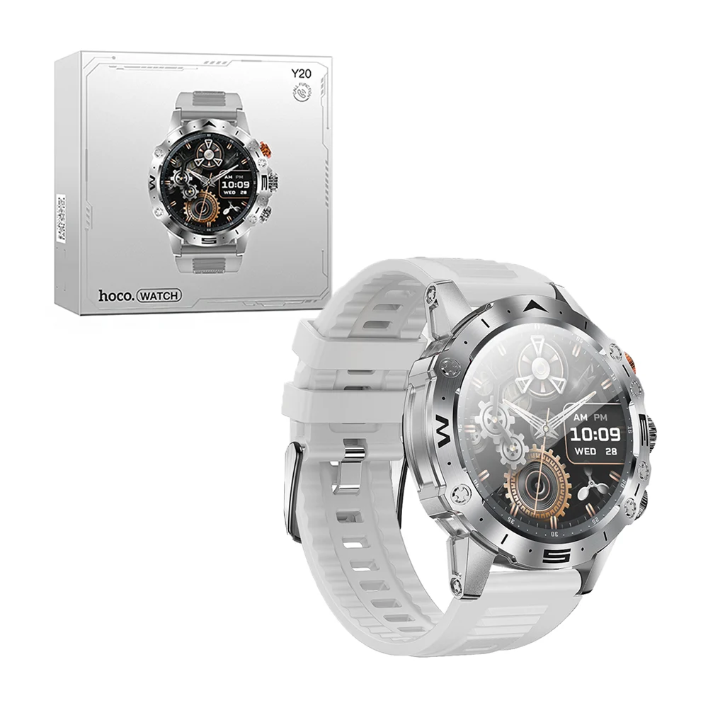 Smartwatch redondo metálico con correa de silicona y cargador magnético