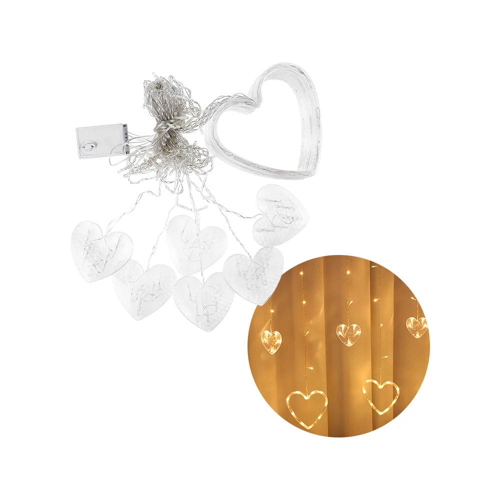 Guirnalda decorativa en forma, cascada con corazones transparentes, tono cálido